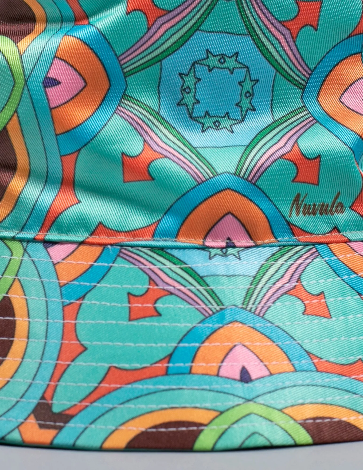 PSYCHEDELIC CROSSES AND STARS TEAL BUCKET HAT